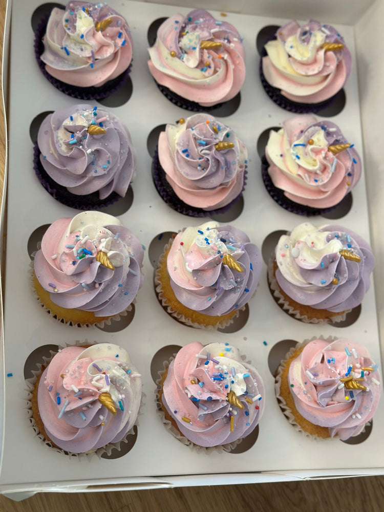 Custom cupcakes with buttercream decoration and candies
