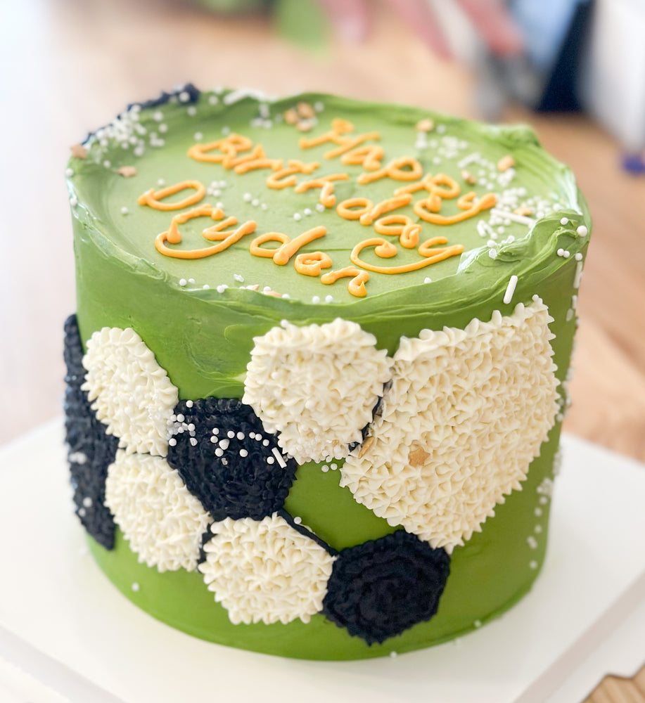 Custom design soccer themed birthday cake